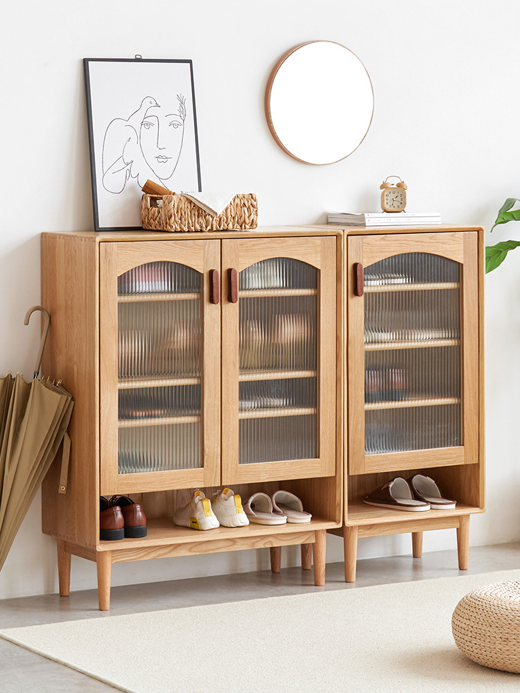 Living room entry doorway oak wood shoes storage cabinets with glass door