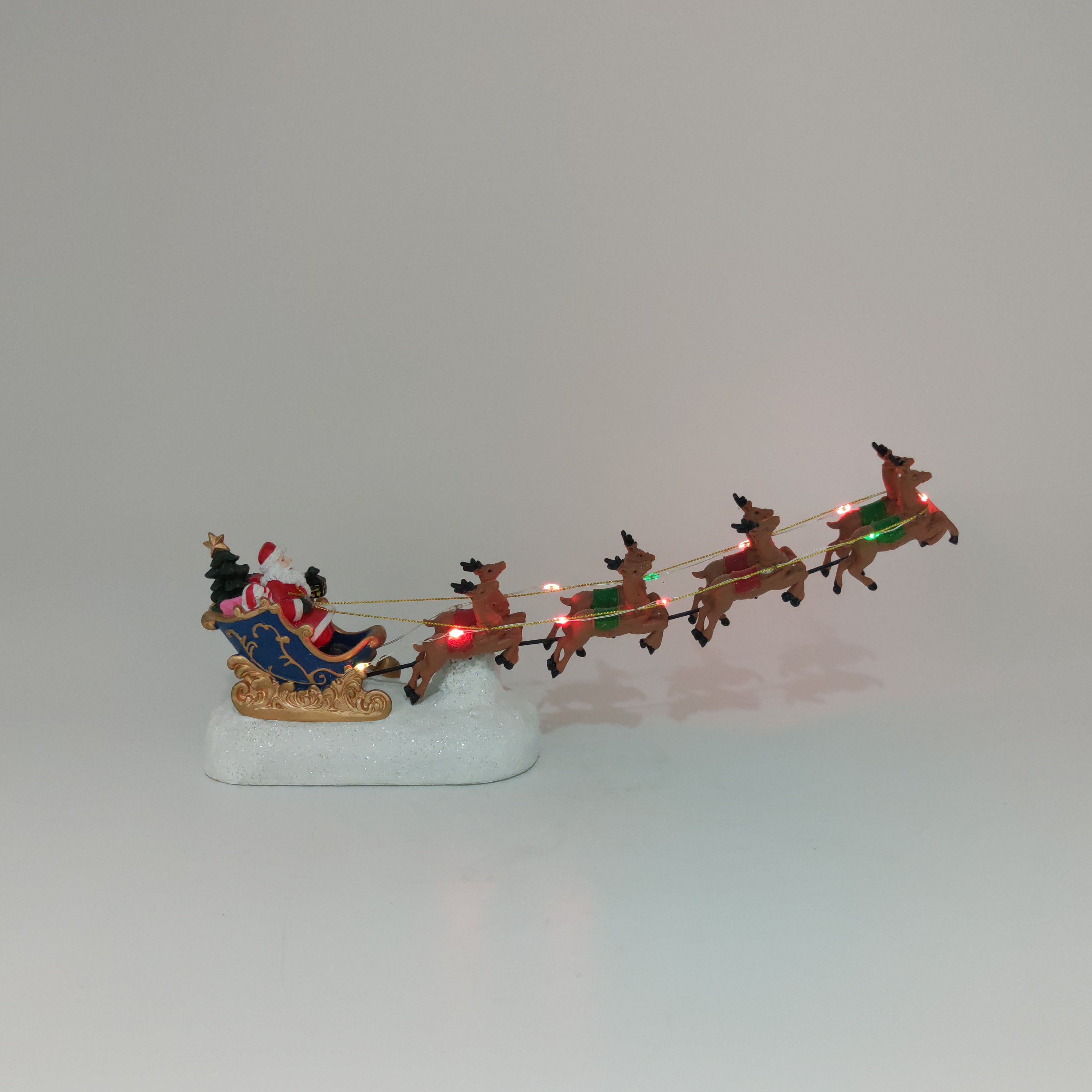 Wholesale resin christmas decoration deer pulling cart led lights electric moving music santa claus in sleigh with reindeer