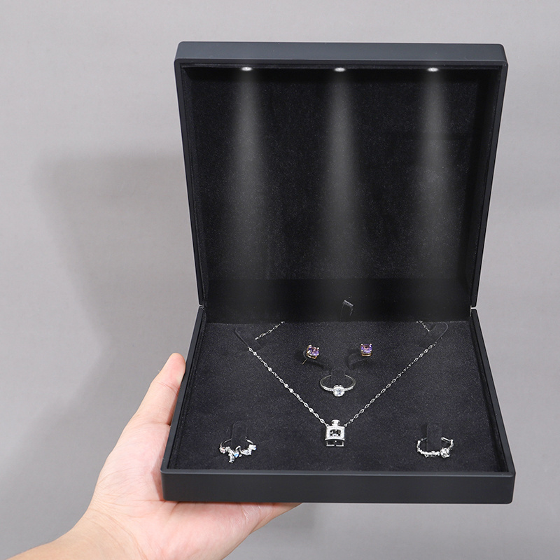 Wholesale custom logo jewelry velvet necklace bracelet packaging box with lighting black plastic led earrings ring jewelry box