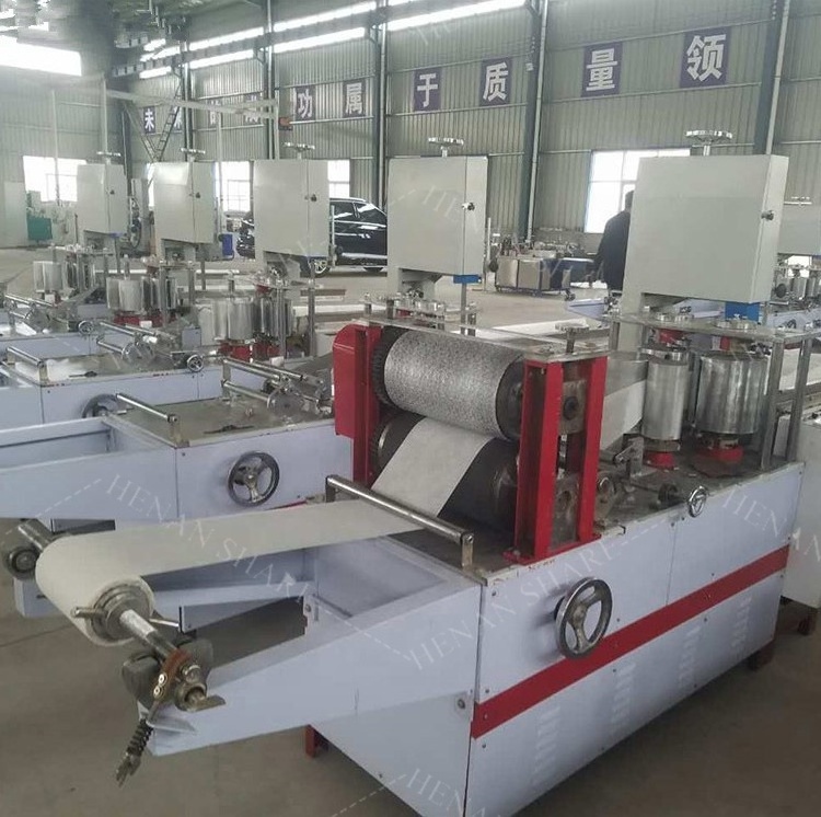 Nonwoven napkin paper embossing press folding machine napkin tissue paper making machine