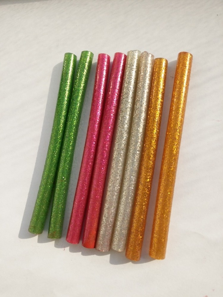 Colorful hot melt glue stick with glitter powder used for Arts and crafts