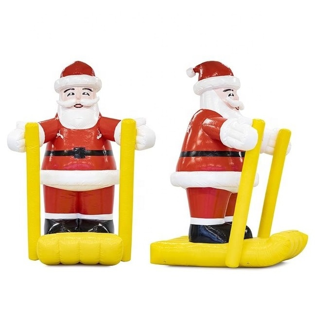 Highquality commercial PVC large Santa Clause on blue skis Christmas inflatable toys blow up santa claus for Christmas