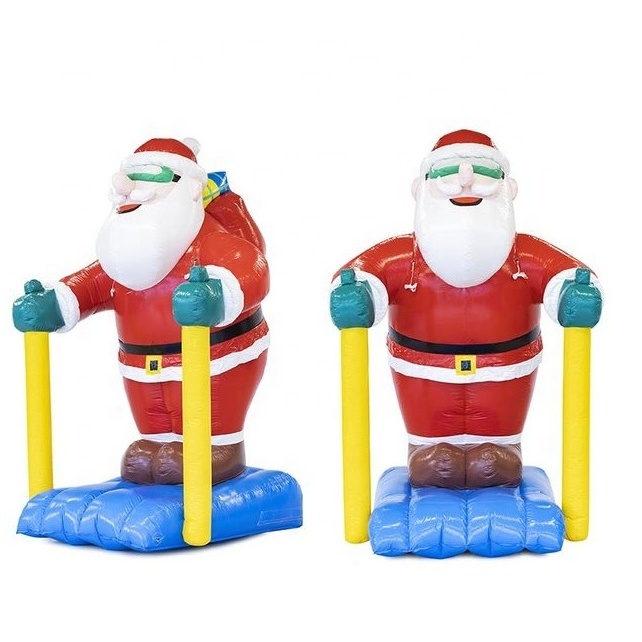 Highquality commercial PVC large Santa Clause on blue skis Christmas inflatable toys blow up santa claus for Christmas