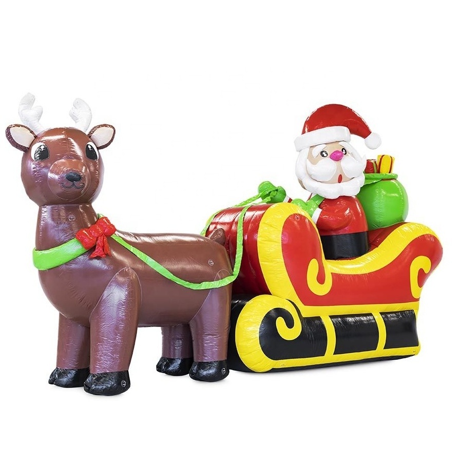 Highquality commercial PVC large Santa Clause on blue skis Christmas inflatable toys blow up santa claus for Christmas