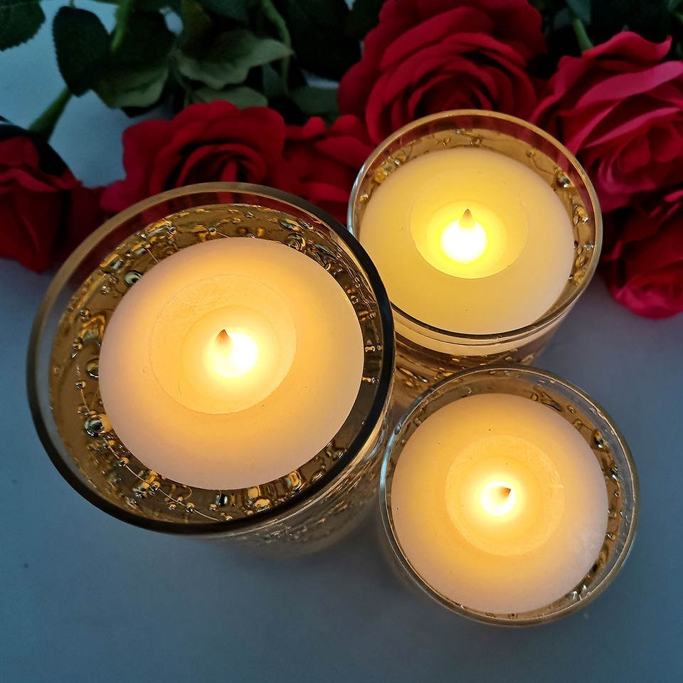 Water activated flickering flame flameless candle wax material LED floating candles for wedding table centerpiece