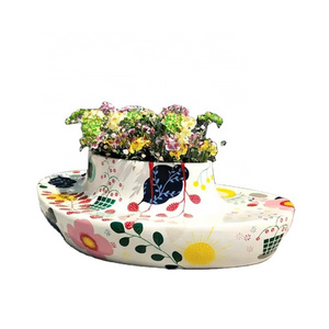 Hot selling modern fiberglass flowerpot seat leisure chair sculpture for shopping mall commercial street