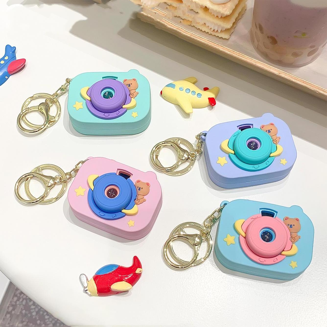 Wholesale Surprise space bear camera buckle projector button switch keyring cute small pendant kaleidoscope projector keychain