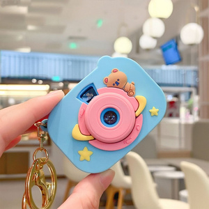 Wholesale Surprise space bear camera buckle projector button switch keyring cute small pendant kaleidoscope projector keychain