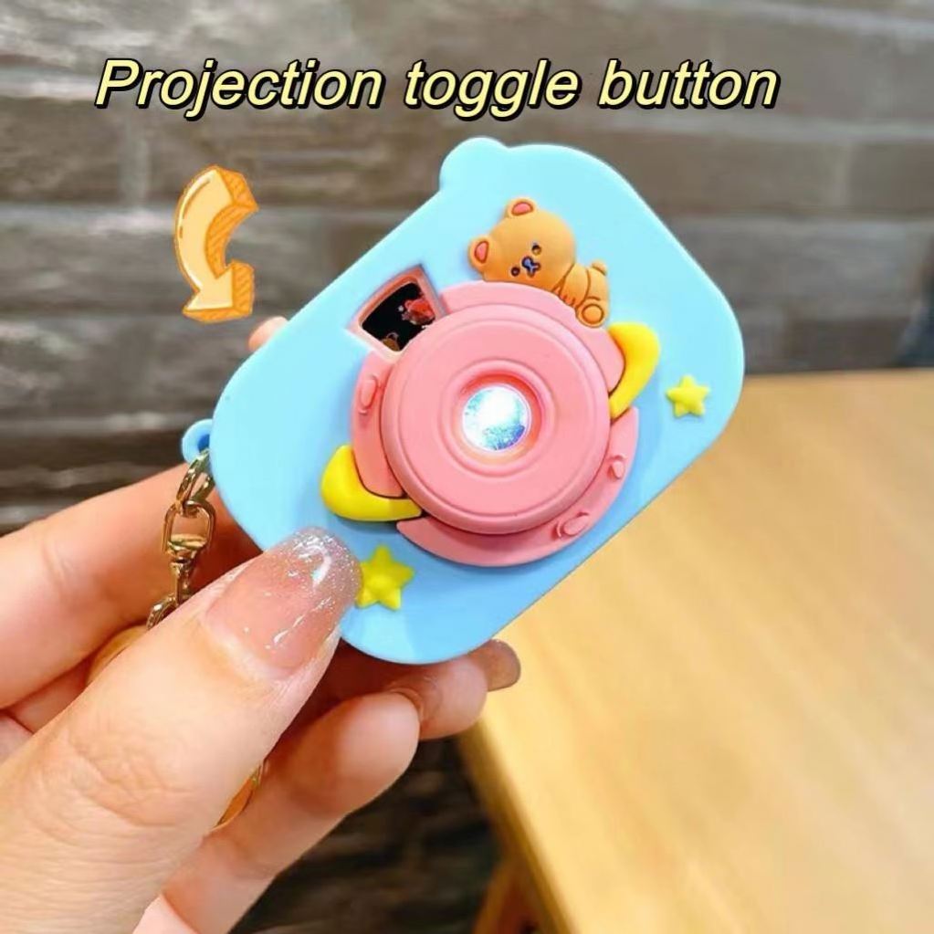 Wholesale Surprise space bear camera buckle projector button switch keyring cute small pendant kaleidoscope projector keychain