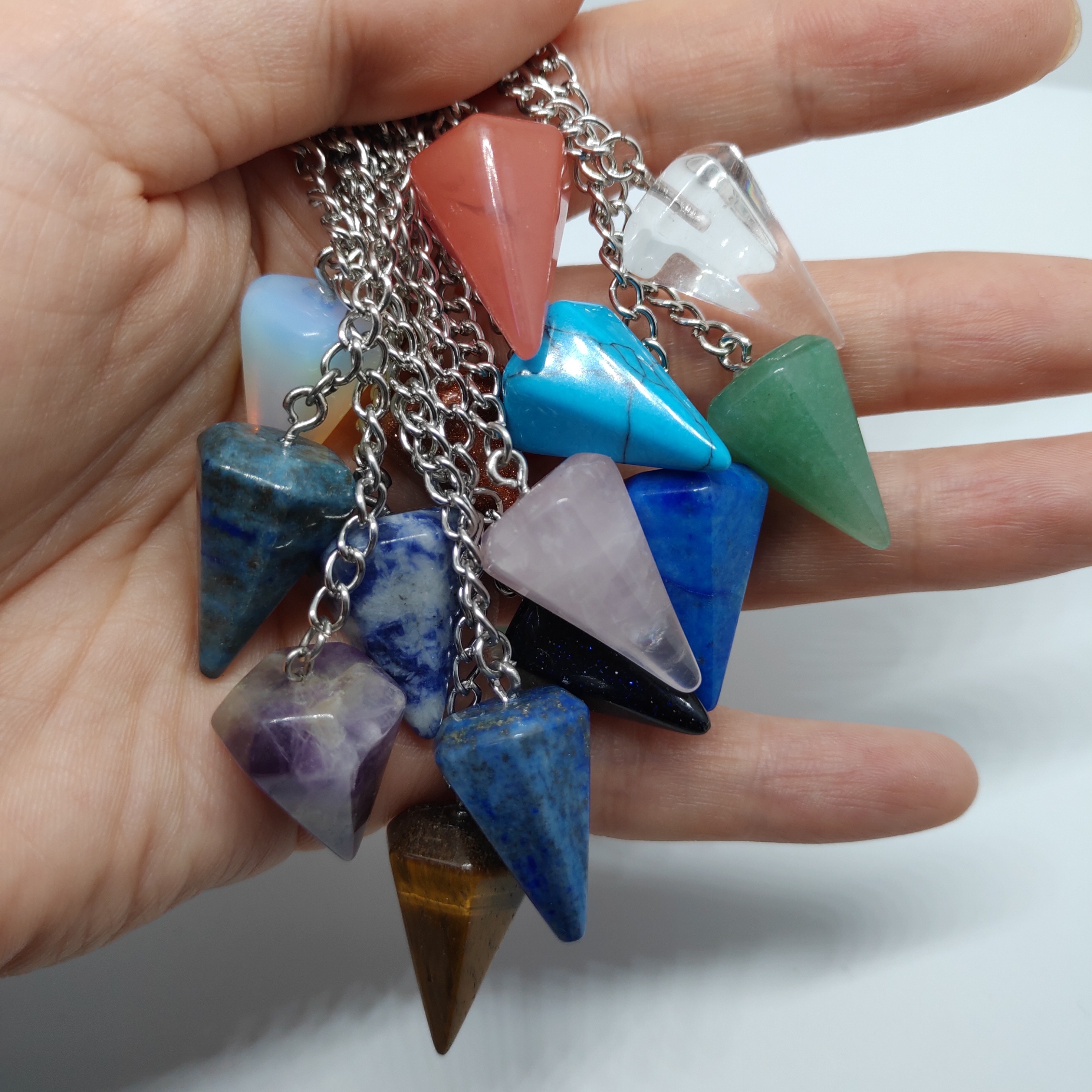 Natural semi-precious stones drawing crystal pendulum Gemstones pendulums healing crystal stones