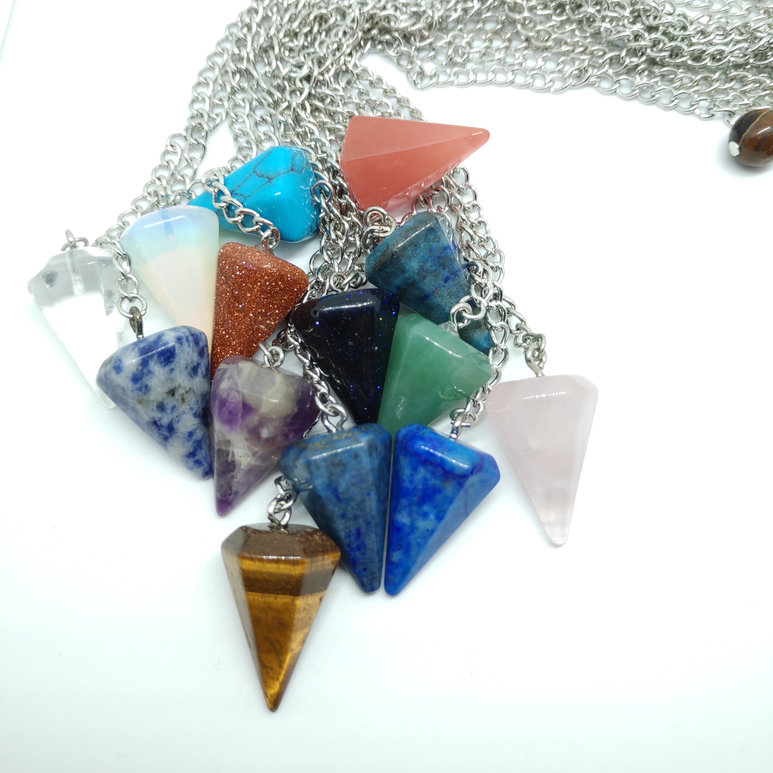 Natural semi-precious stones drawing crystal pendulum Gemstones pendulums healing crystal stones