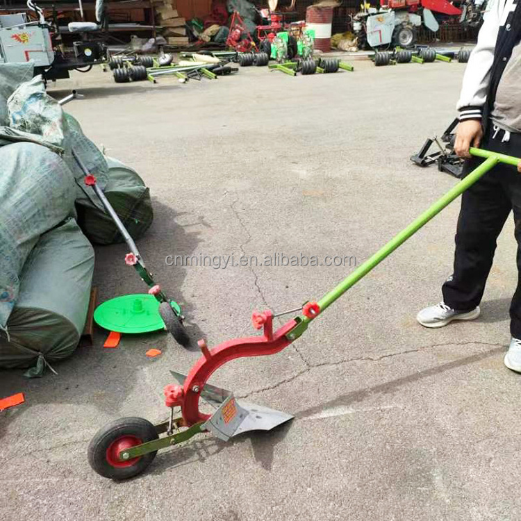 Factory price manual mini tiller cultivator/hand plough machine for sale