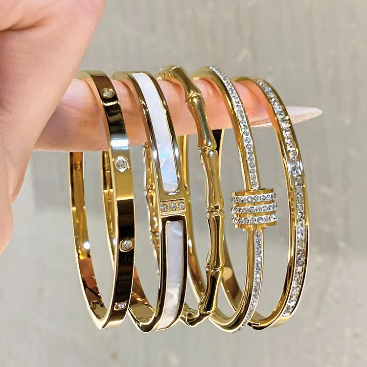 Wholesale 18k gold plated non tarnish men women nice charm jewelry stainless steel bangle bracelet mixed designs stock lot