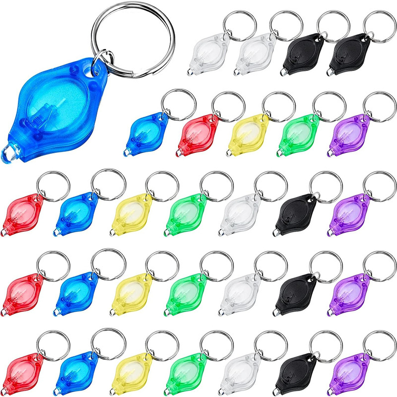 Mini Keychain Squeeze Light Micro LED Flashlight Torch Emergency Key Ring Light for Outdoor Camping Hiking