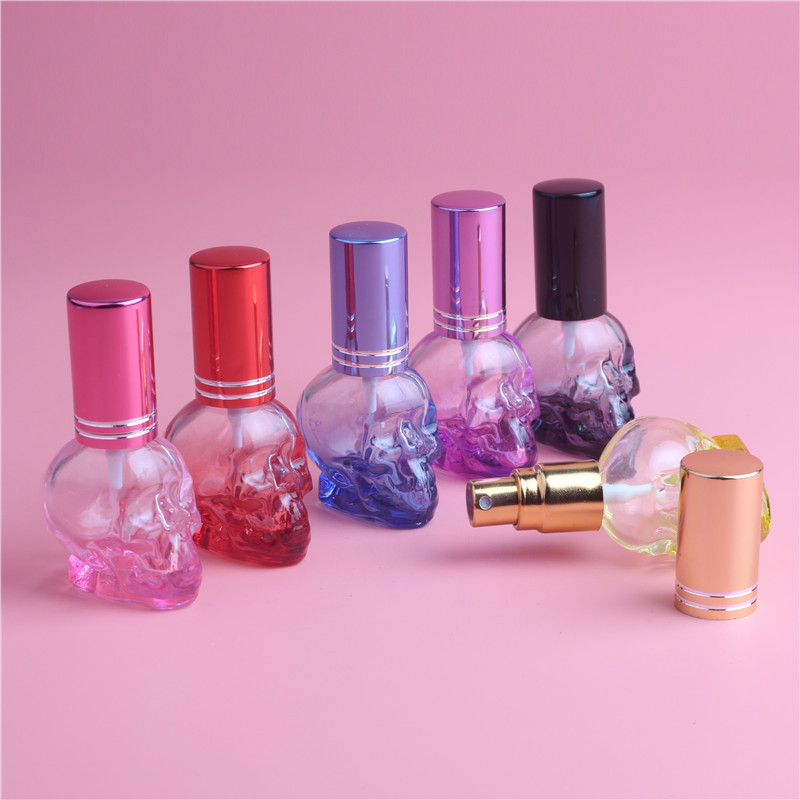 MUB new design 8ml skull head Shaped  Refillable Aluminum Cap Glass Perfume Bottle Aluminum Pump Spray Glass Bottles