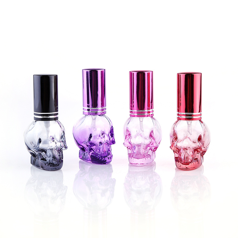 MUB new design 8ml skull head Shaped  Refillable Aluminum Cap Glass Perfume Bottle Aluminum Pump Spray Glass Bottles