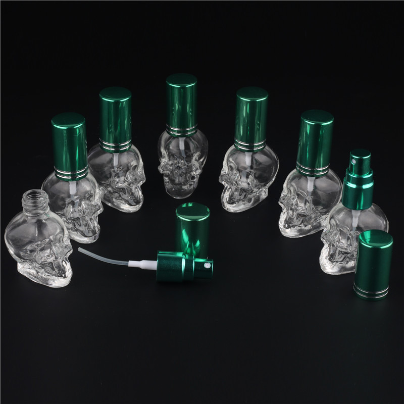 MUB new design 8ml skull head Shaped  Refillable Aluminum Cap Glass Perfume Bottle Aluminum Pump Spray Glass Bottles