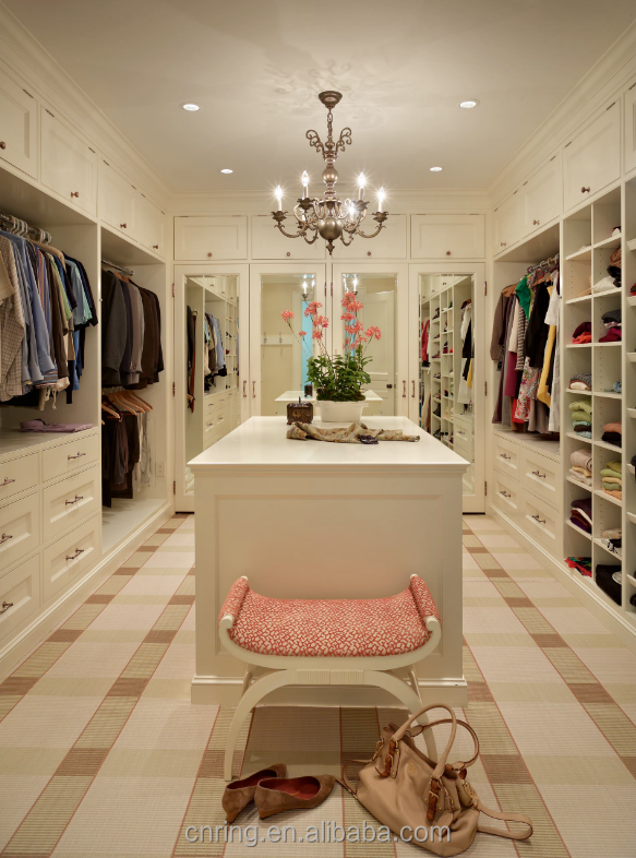 Luxury U shape walk-in closet with dressing table and island drawers for ties and jewelry