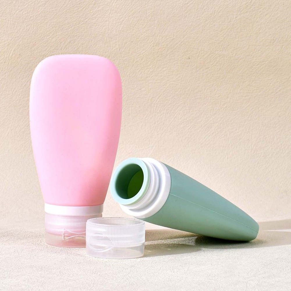 New arrival travel 30ml 60ml 90ml pink silicone facial cream shampoo tube conditioner silica gel squeeze tube with flip lid