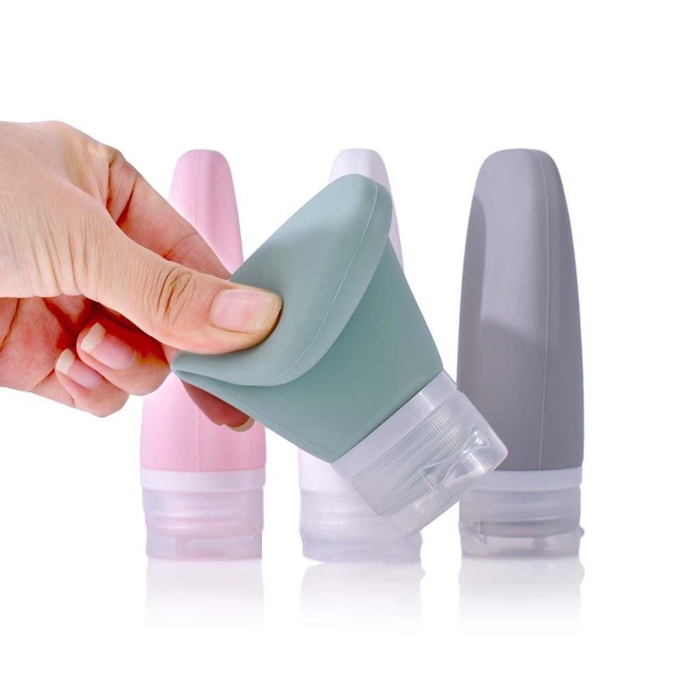 New arrival travel 30ml 60ml 90ml pink silicone facial cream shampoo tube conditioner silica gel squeeze tube with flip lid