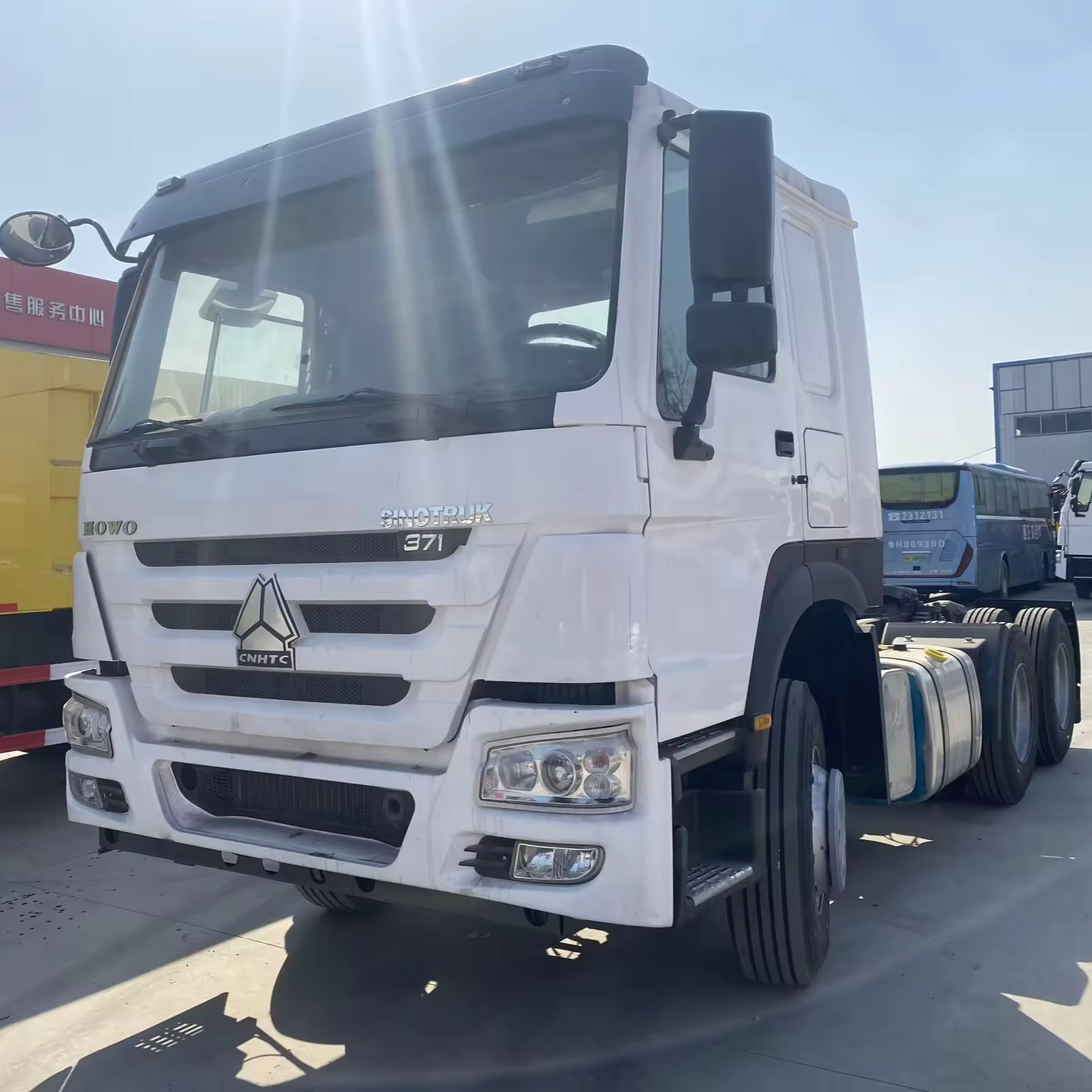 Brand new RHD double sleeper 6X4 HOWO tractor truck 371HP with 1600L extra fuel tank for sale