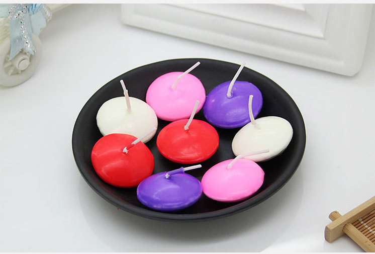 Hot sale 1.5*3.8 cm real wax water activated floating candles wedding party decoration centerpiece candle