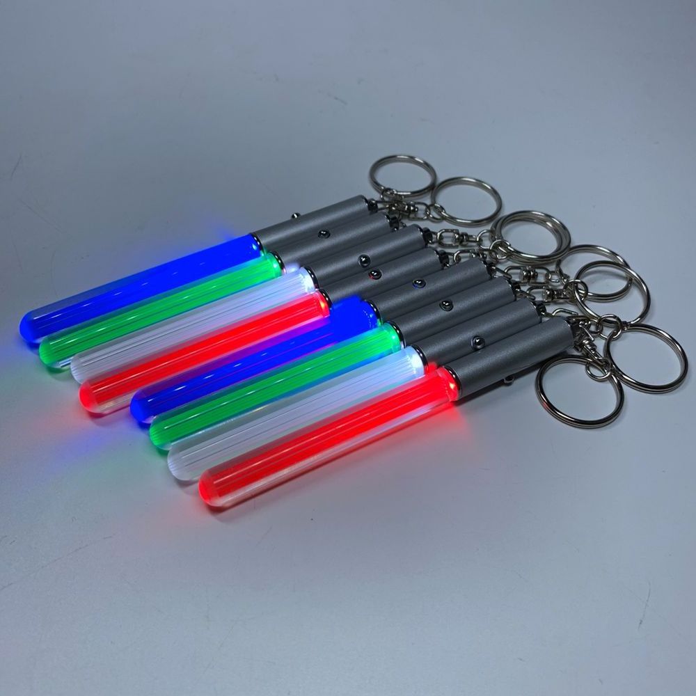 Promotional OEM customized LOGO LED lightsaber stick glowing acrylic keyring colorful LED keychain