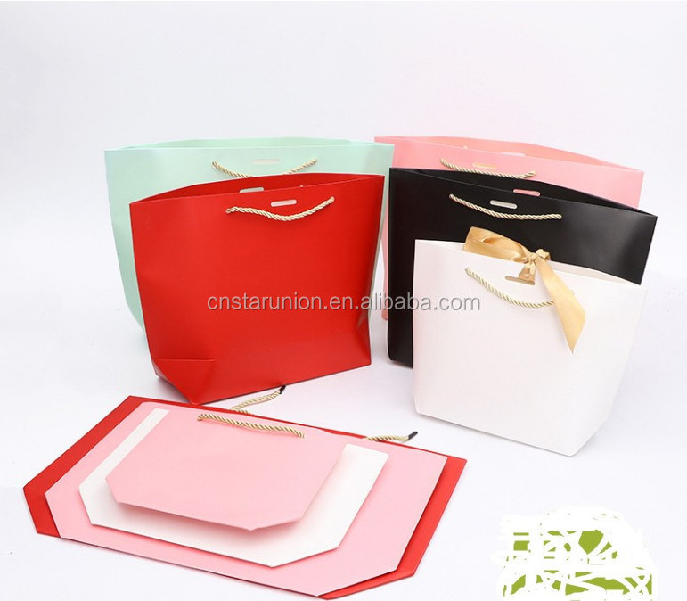 Wholesale cheap price custom logo pink mini small luxury paperbag fancy favor wedding door paper gift bag with ribbon handles