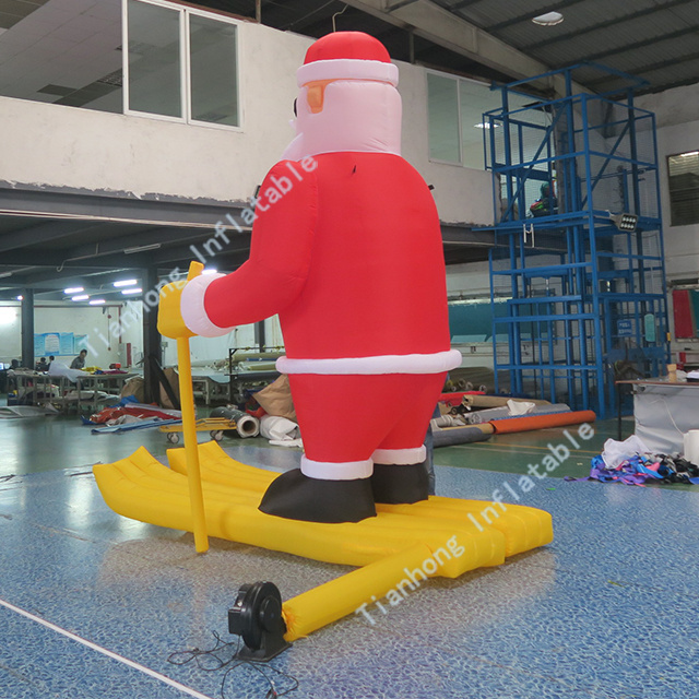 4 meters giant inflatable skiing Santa Claus character lovely outdoor inflatable santa claus for christmas decoration