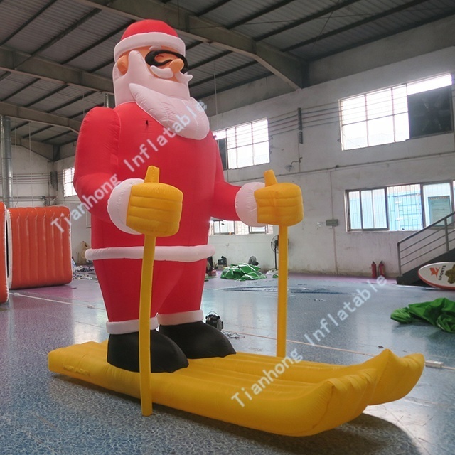 4 meters giant inflatable skiing Santa Claus character lovely outdoor inflatable santa claus for christmas decoration