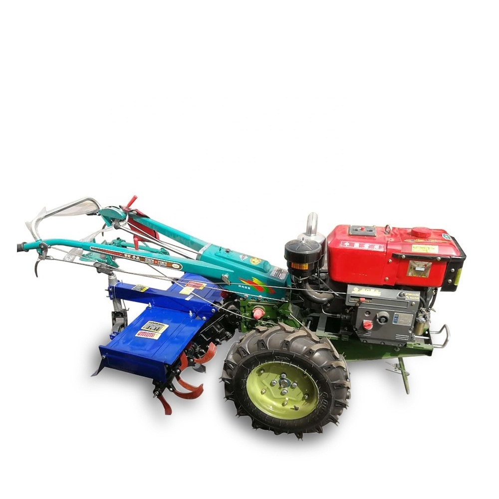 Mini farm tractor hand ploughing machine