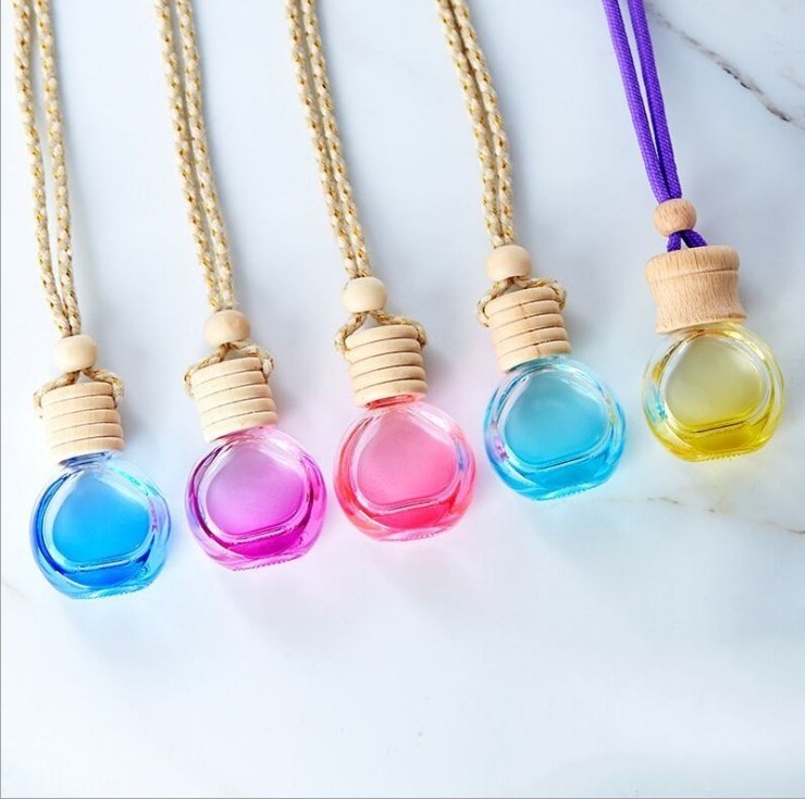 5ml 6ml 8ml 10ml Wholesale diffuser empty hanging car perfume bottle with wooden cap car aroma diffuser glass bottles