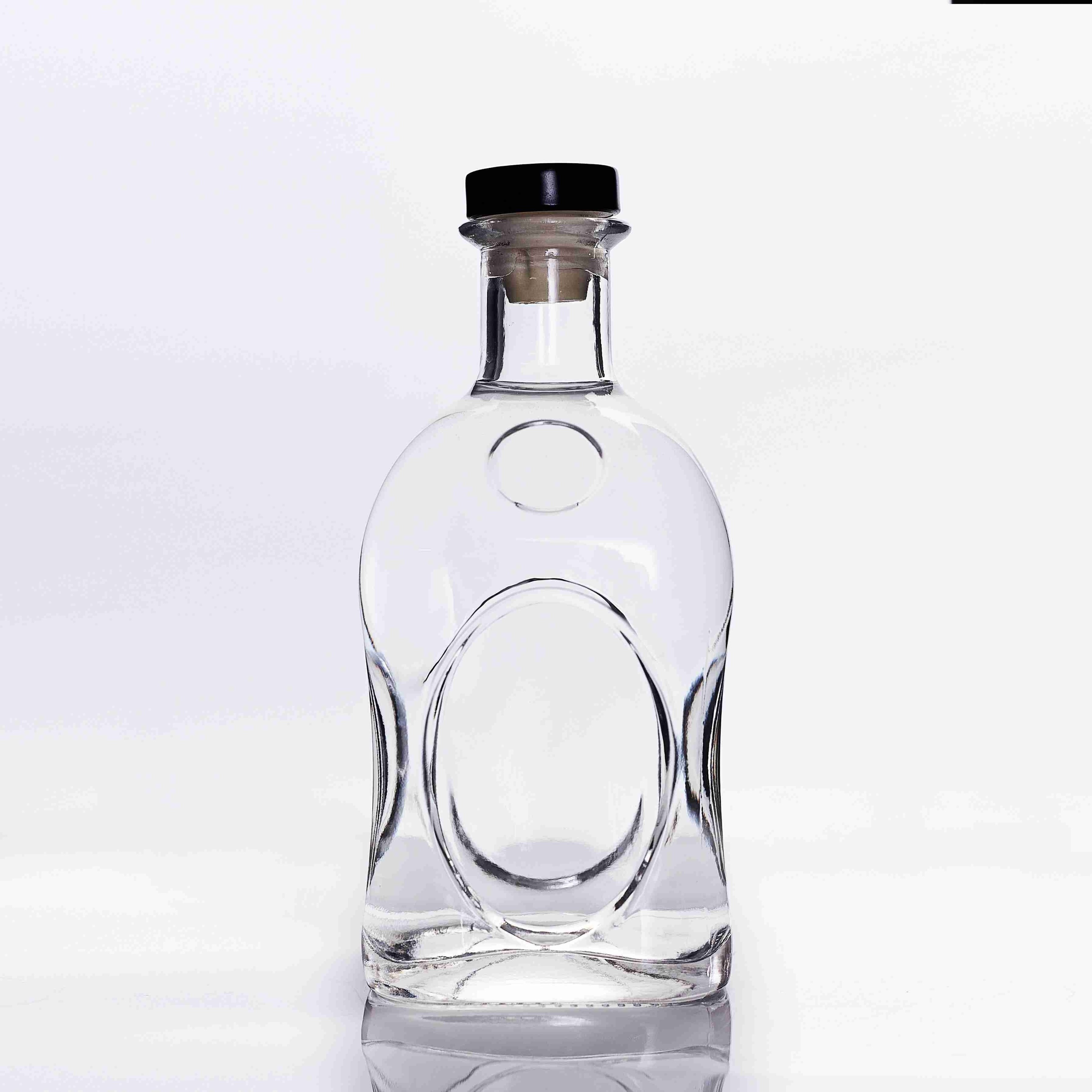 Factory customize top quality brandy bottle 700ml frosted clear carved labeled brandy liquor glass bottle