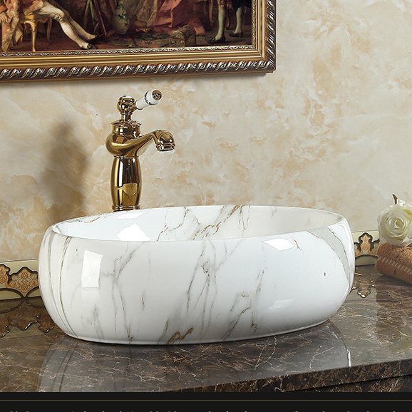 Hot sale India Luxury Style Bathroom Marble Counter top Ceramic Handmade Wash Basin Above Counter Mounted Oval Shape Art Sink