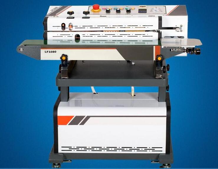 Commercial continuous band sealing machine with vacuum sealer