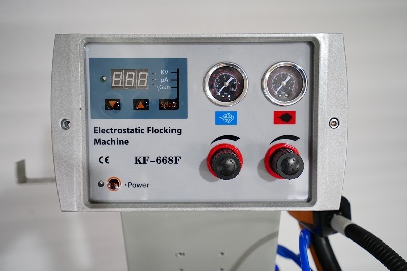 Electrostatic flocking machine