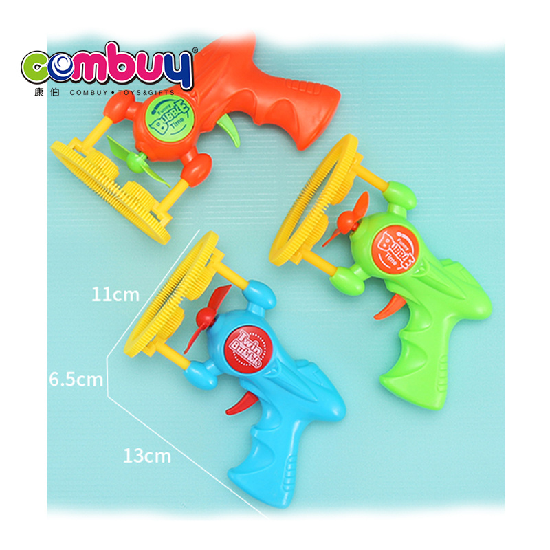 Outdoor kids play electric toys soap bubble blower gun