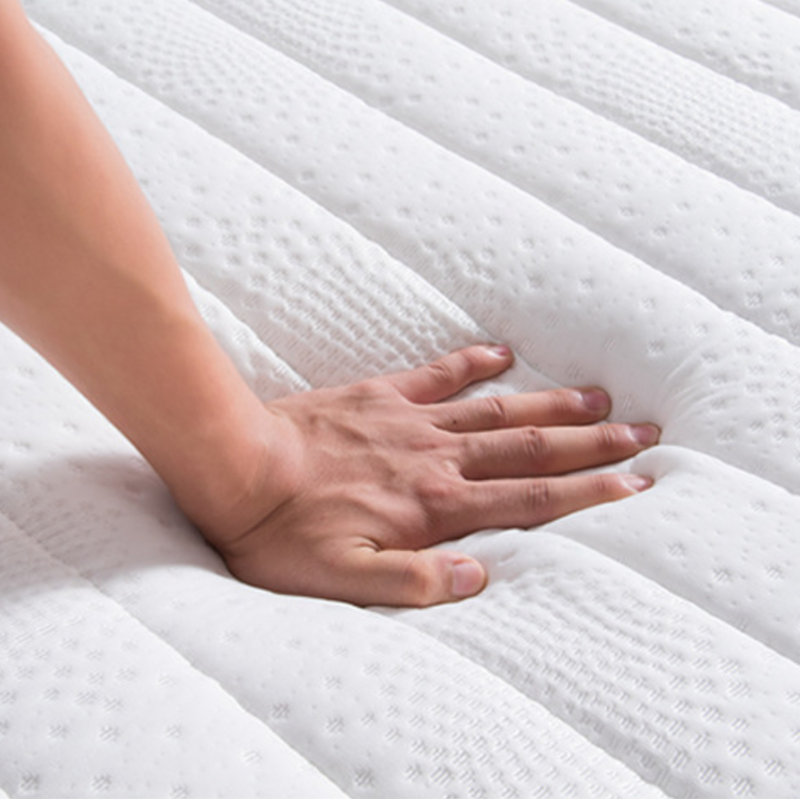 Rolled up memory foam mattress