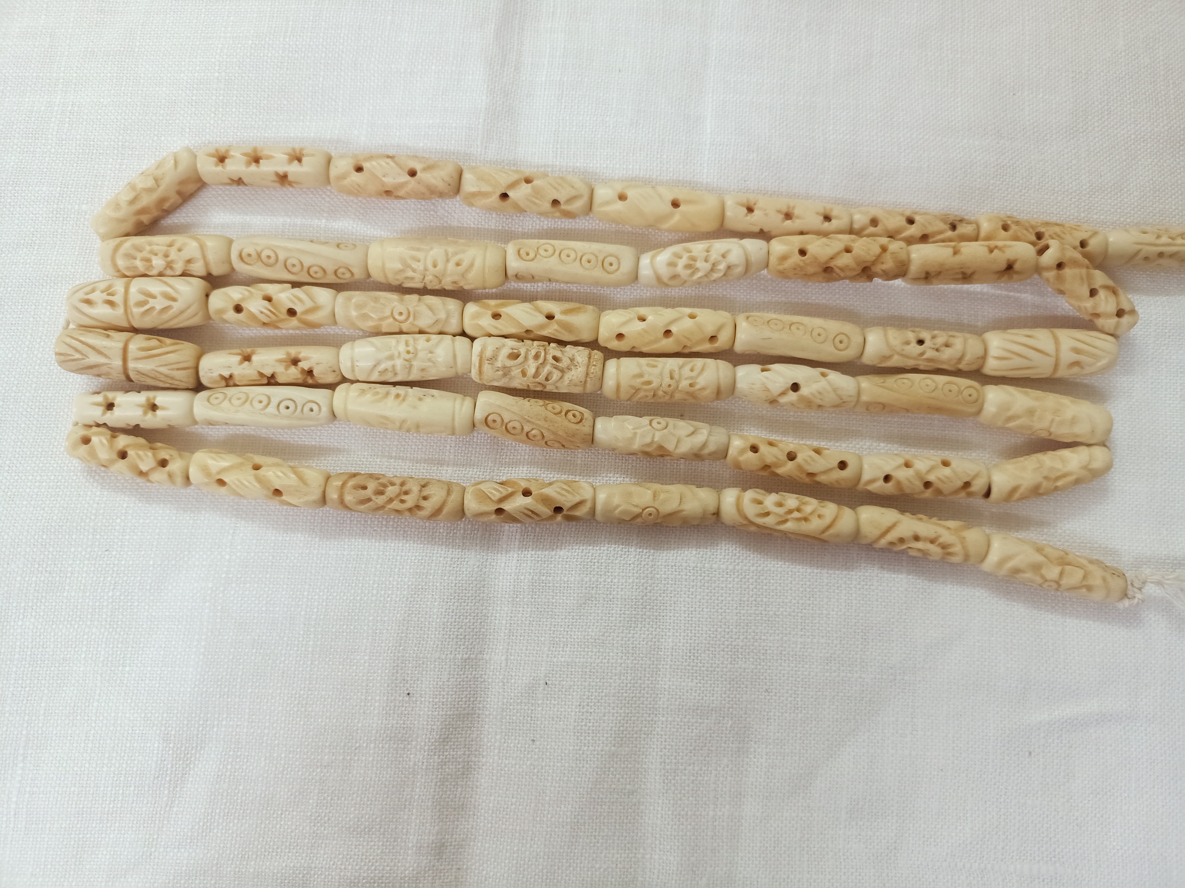 custom made hand carved bone beads in bone hair pipe beads ideal for bone jewelry designers and bead stores