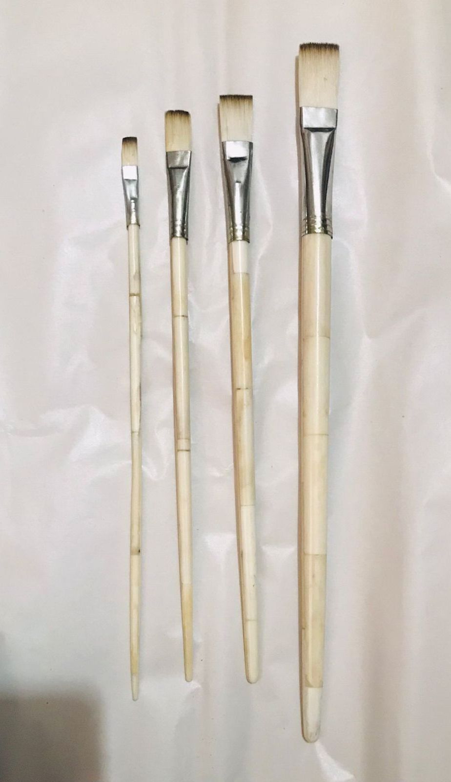 custom made hand made bone paint brushes made from bone ideal for painters and artist suitable for resale