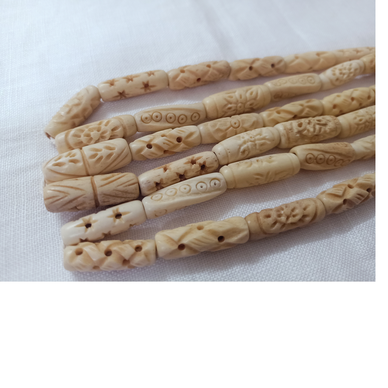 custom made hand carved bone beads in bone hair pipe beads ideal for bone jewelry designers and bead stores