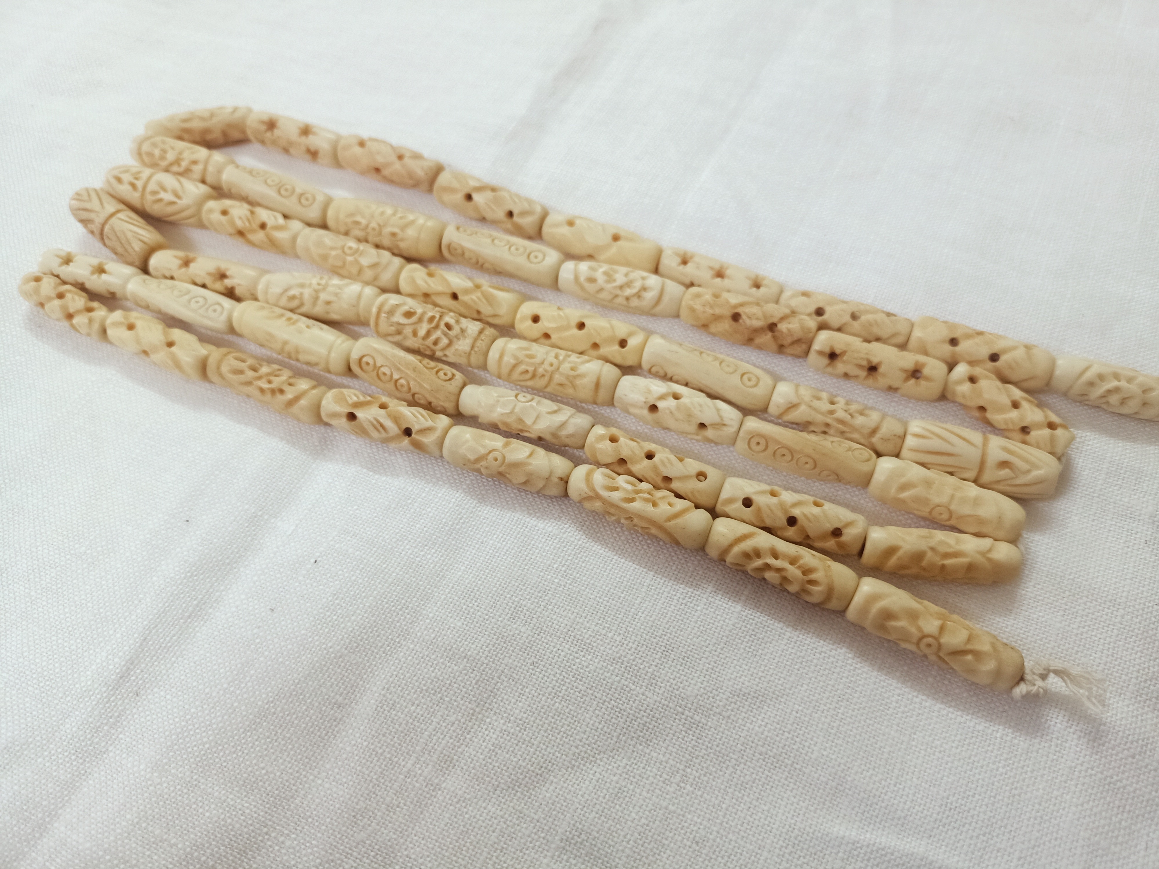 custom made hand carved bone beads in bone hair pipe beads ideal for bone jewelry designers and bead stores