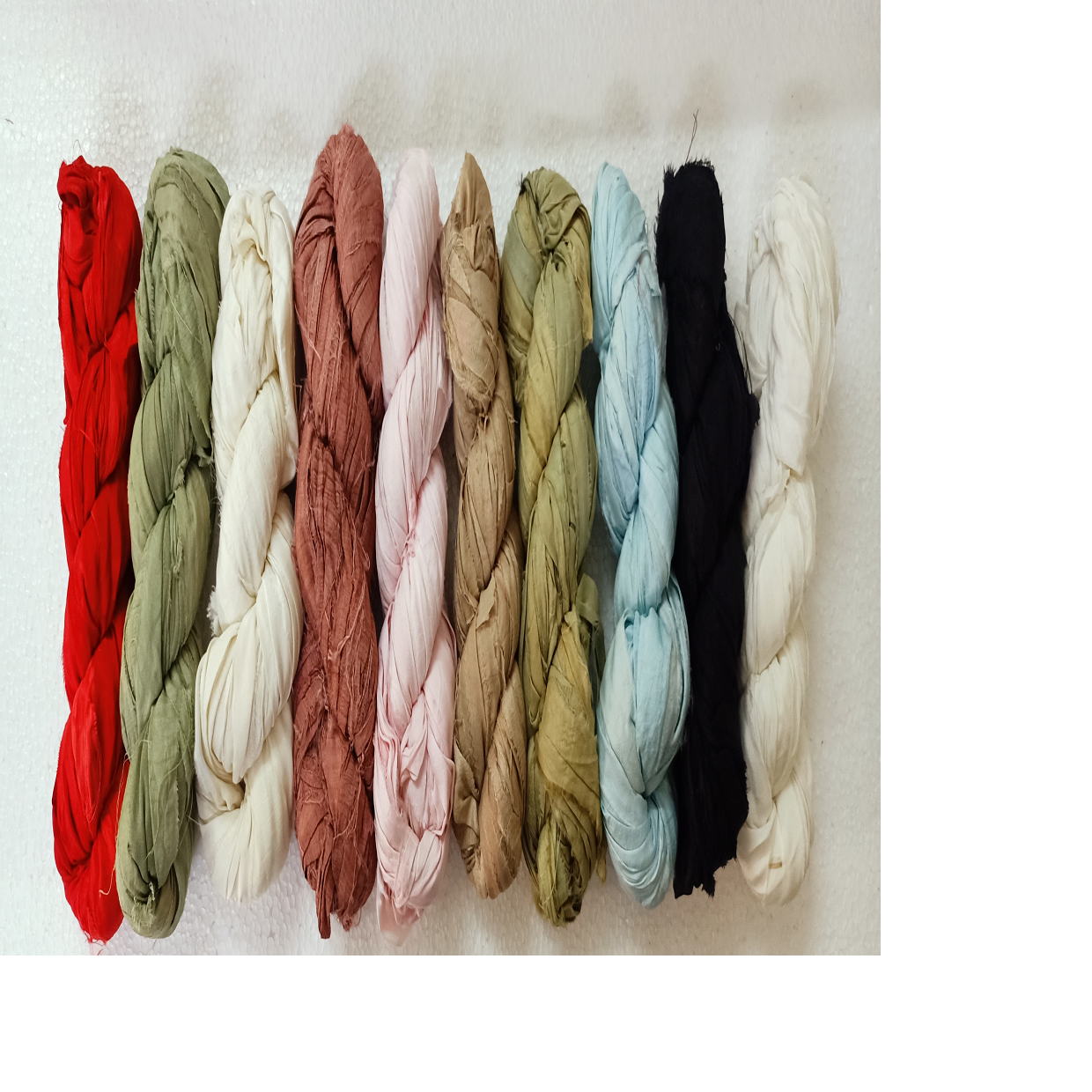 custom made premium quality custom dyed sari silk ribbons in 100 Gram skeins, ideal for resale