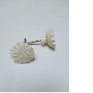 custom made hand carved bone door knobs with floral patterns ideal for interior designers and home furnishing stores