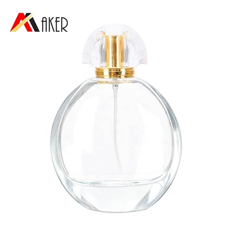 2024 New arrival luxury round 100ml clear crystal glass perfume bottle with gold mist sprayer