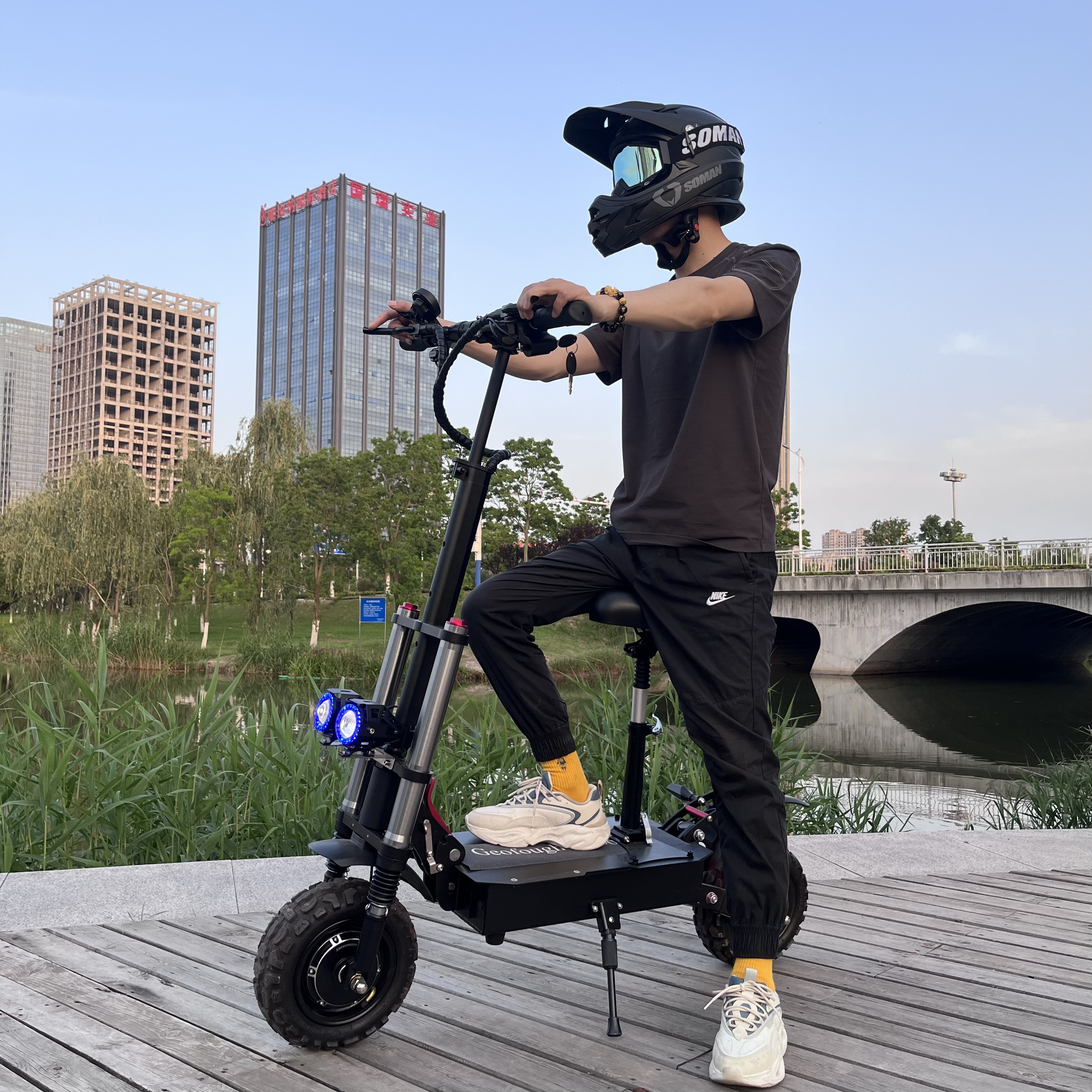 Powerful 60v 6000w 11 inch off road long range dual motor electronic scooter with big display boyueda 5600w electric scooter 72v