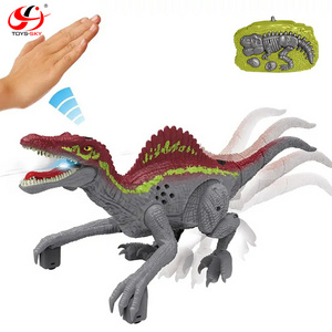 2.4G 2CH Simulated Spinosaurus Remote Hand Induction Control Electric Walking Led RC Dinosaur Robot Animal Toy With Light Sounds