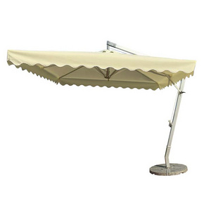 white outdoor tropical sea beach bed lounge table parasol sun umbrella with fringe