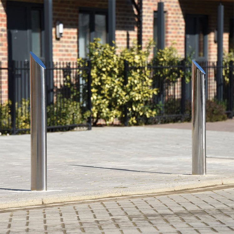 outdoor driveway pavement crowd short height metal road safety bollard outside vehicle traffic barrier