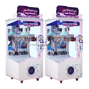 Hot Sale Mini Metal Coin Pusher Prize Gift Game Machine 220v for Shopping Mall Lucky Planet S 60 Clips Clamp